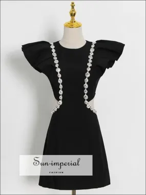 Black O Neck Cutout Waist Sleeveless Mini Dress with Ruffle Shoulders with Diamond detail