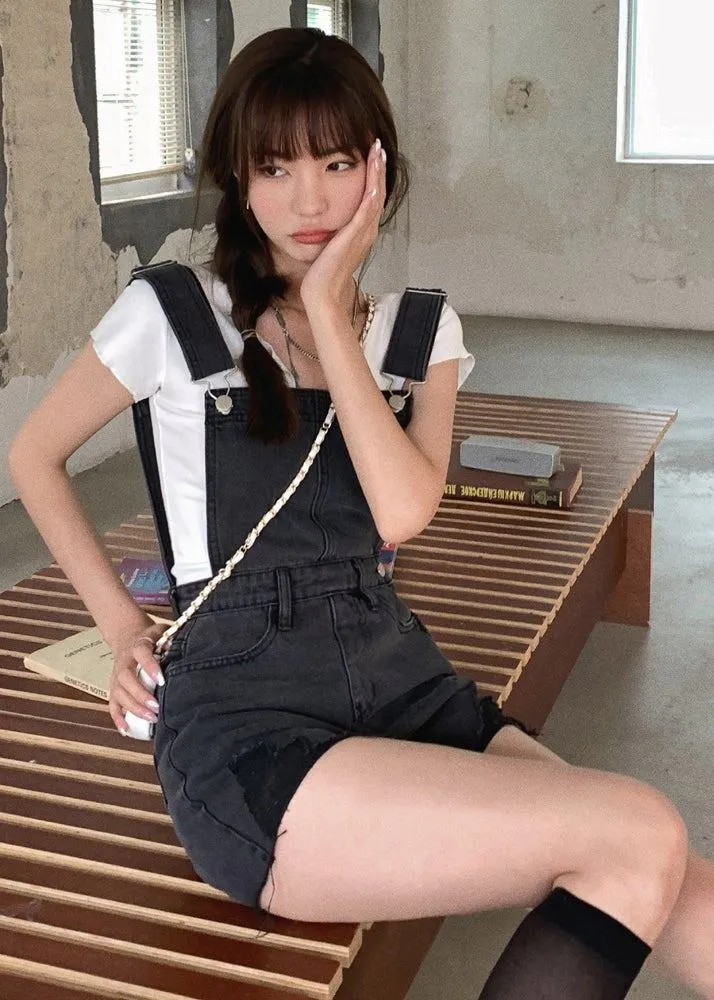 Even Supermodels Wear Overalls short ripped black denim overalls